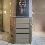 Marble-Top Sideboard Cabinet with Five Fluted Drawers, Rounded Light Wood Veneer Frame, and Brass Accent Details